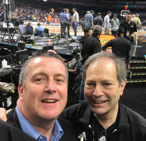 Chris poses with Kansas Associate AD Jim Marchiony on Final Four Friday. Jim hired Chris at the NCAA in 1996